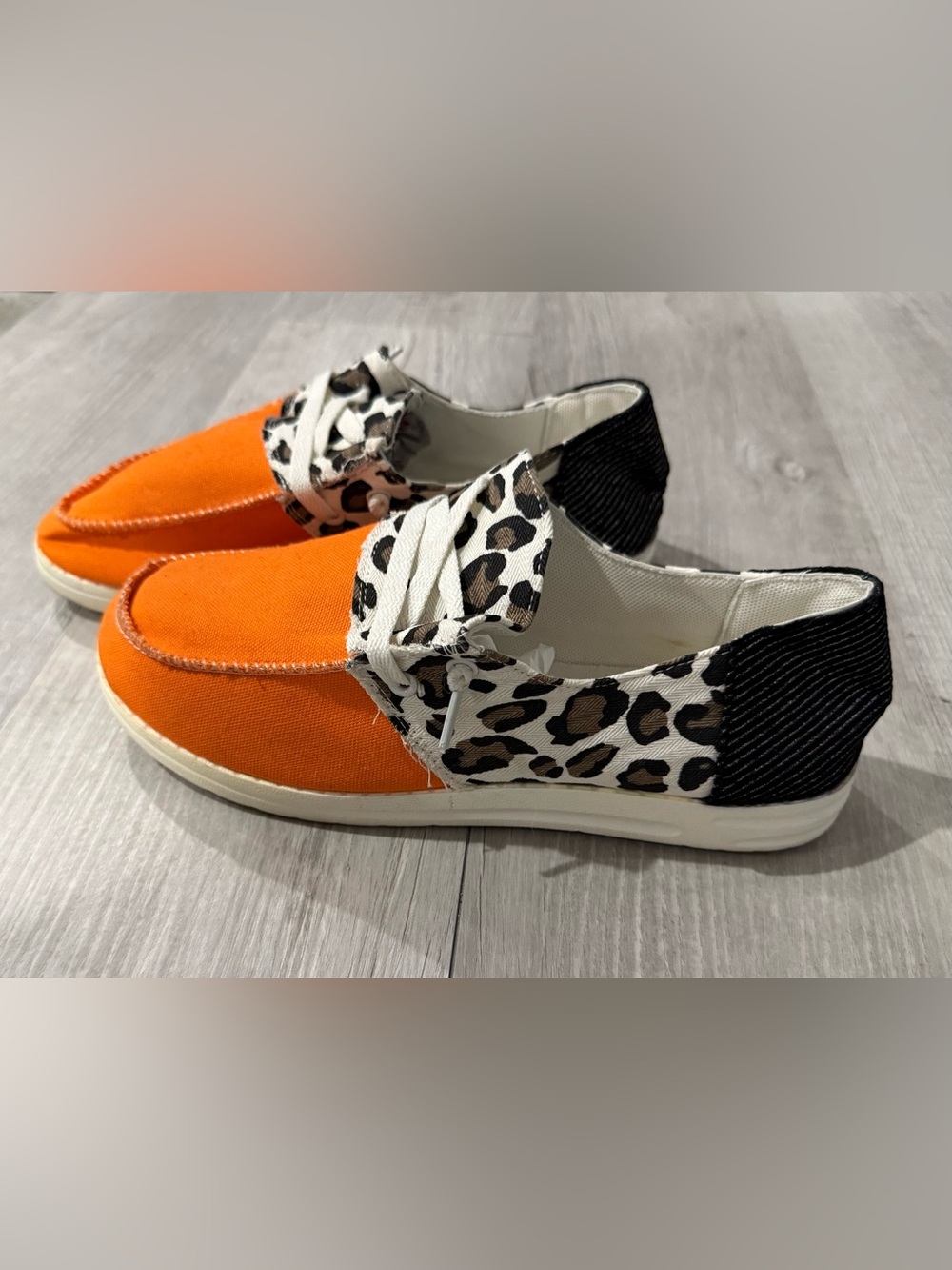 Women’s Low Top Lace-Up Athletic Sneakers Orange Animal Print Black White